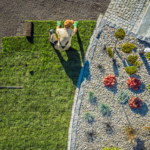 A vibrant collage featuring residential landscape installation stages by Turf Worx, including a tractor moving rich topsoil, automatic sprinklers watering a lawn, a fresh roll of green sod being laid, and a beautifully manicured grass yard with blooming spring flower beds. Landscape enhancement services